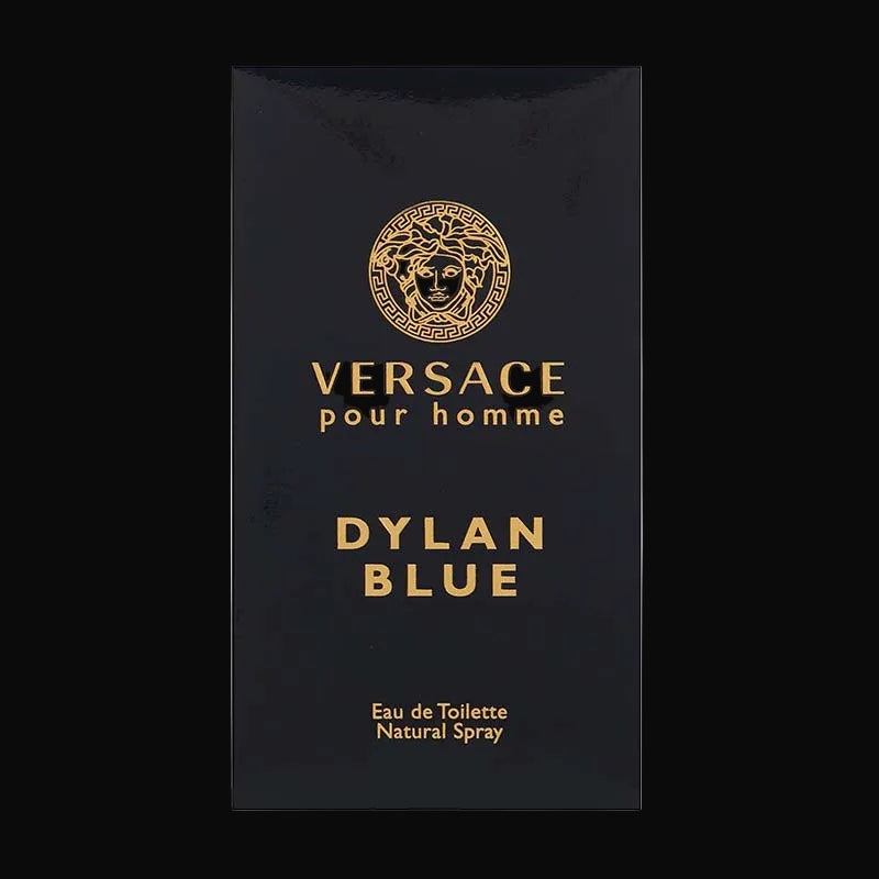 A sapphire-colored glass bottle of Versace Pour Homme Dylan Blue Eau De Toilette Spray, with the brand's Medusa head logo on the front.